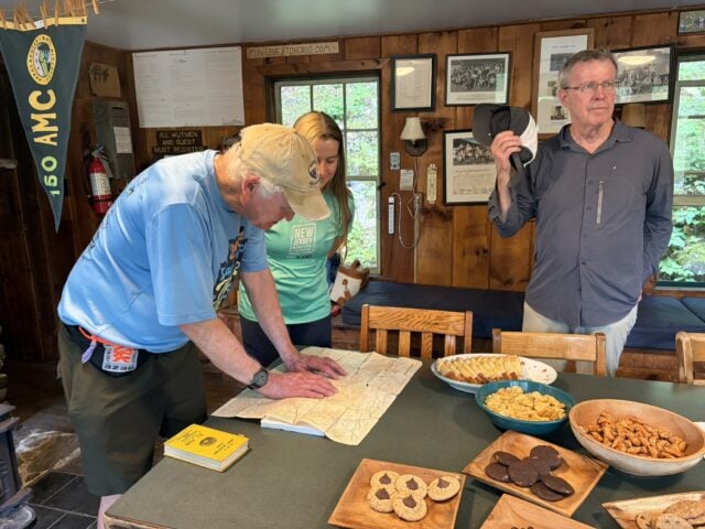 Doug Teschner steps in to provide trail information to visitors
